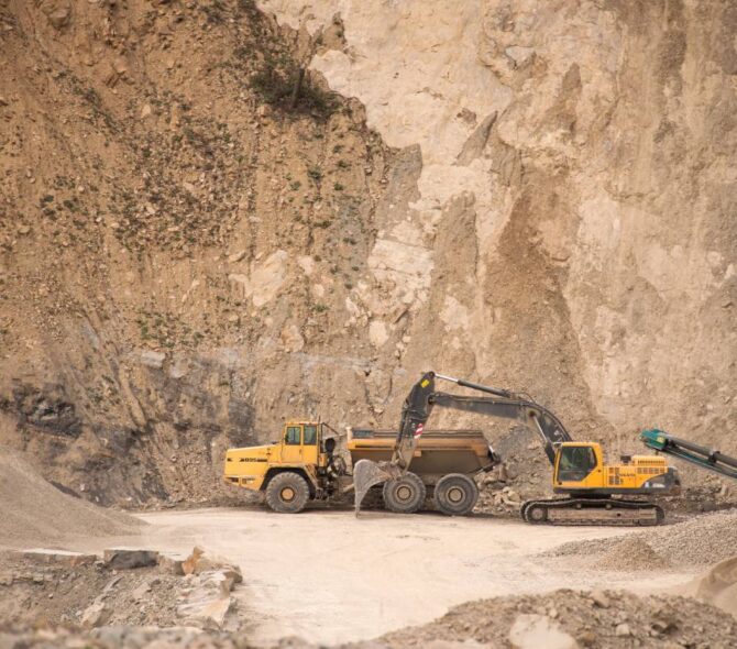 Excavation equipment in active quarry.
